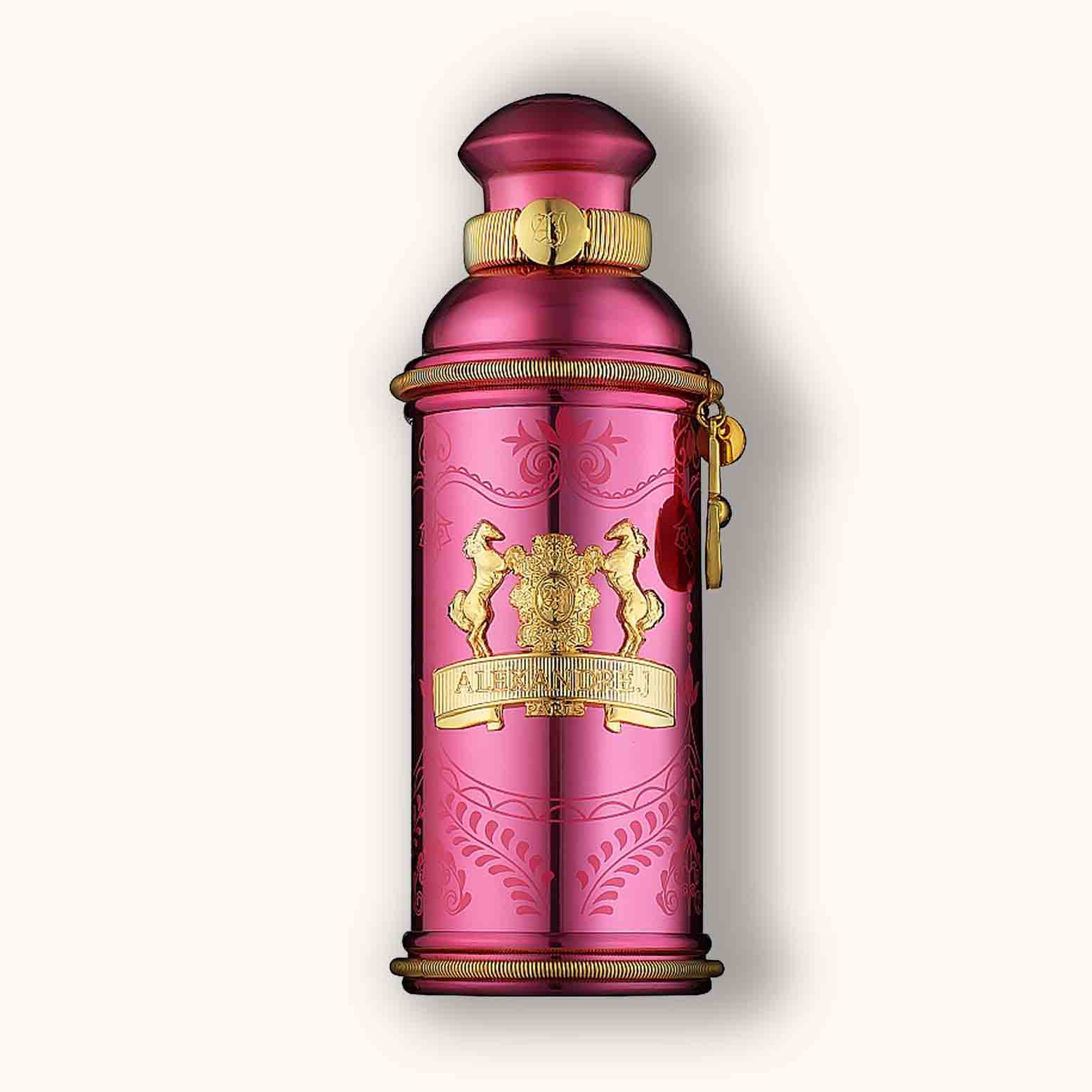 Elegant bottle of Alexandre.J Altesse Mysore, featuring a vibrant pink design adorned with gold accents and intricate floral patterns, embodying a luxurious fragrance experience.