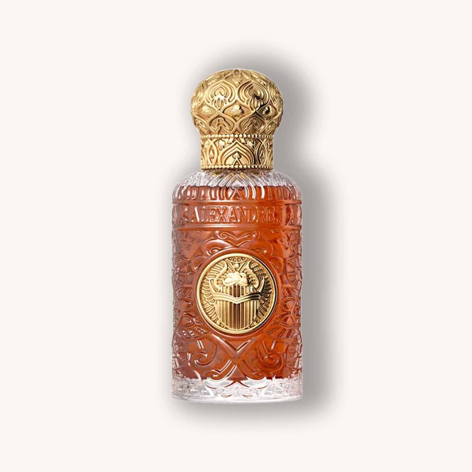 Alt text: A luxurious bottle of Alexandre.J Black Beetle Extract, featuring an ornate gold cap and intricately designed glass, filled with a rich amber fragrance.