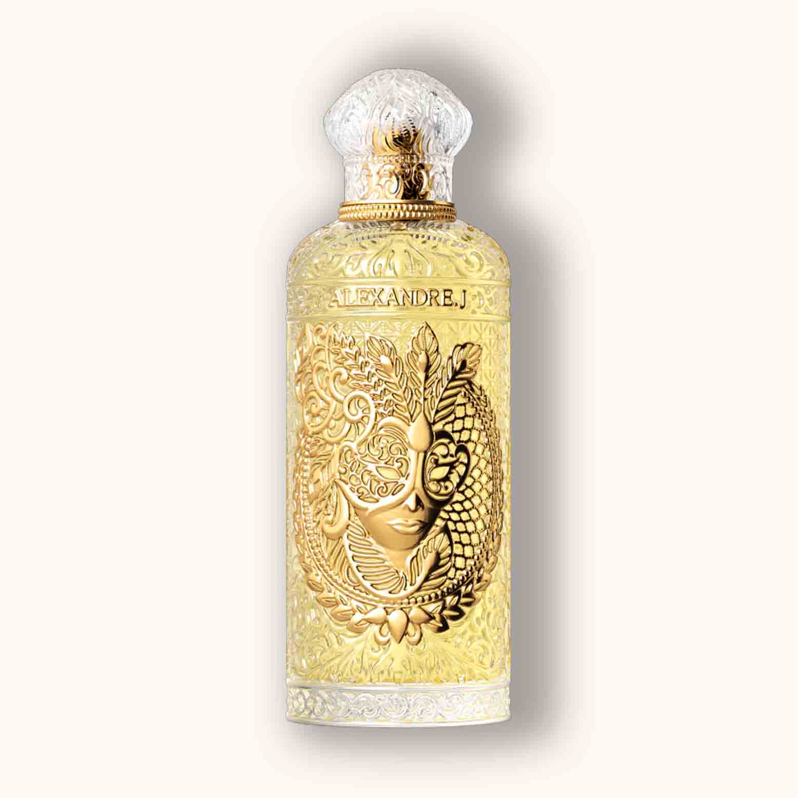Alt text: A luxurious bottle of Alexandre.J Gold Oriental Enigma perfume, featuring an ornate design with a golden finish and intricate detailing, showcasing a masked face motif.