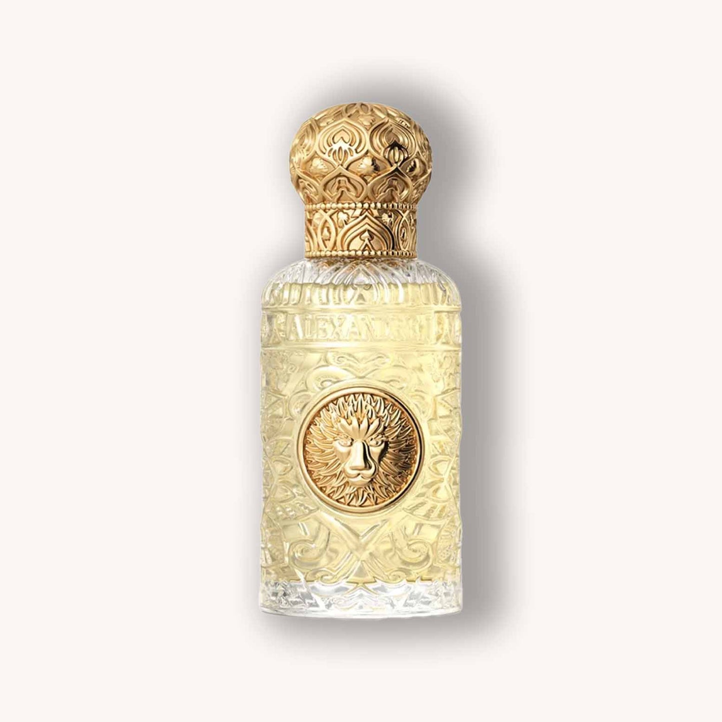 Alt text: A luxurious bottle of Alexandre.J Majestic Nard Extract, featuring an ornate gold cap and intricate detailing on the glass. The fragrance is presented in a clear, elegant container that highlights its rich golden hue.