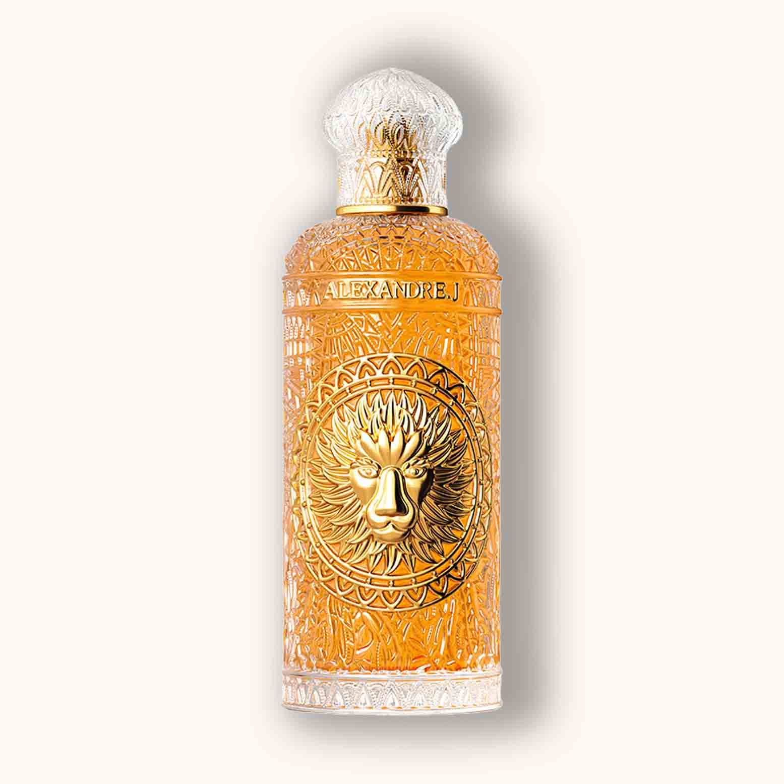Alt text: A beautifully designed bottle of Alexandre.J Gold Majestic Nard perfume, featuring intricate lion motif and elegant golden amber liquid inside.