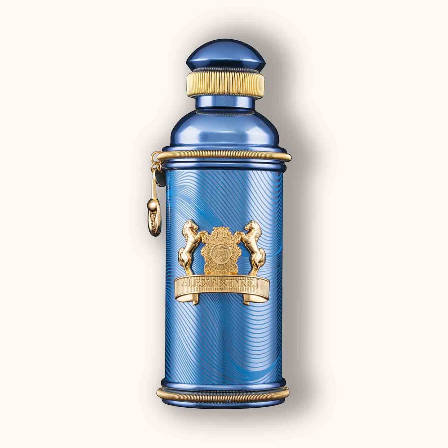 Alt text: A luxurious bottle of Alexandre.J Zafeer Oud Vanille, featuring a striking blue design with ornate gold accents and a decorative charm.