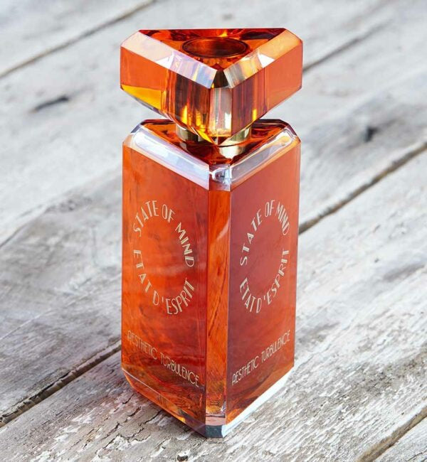 Promo shot of a perfume bottle State of Mind Aesthetic Turbulence