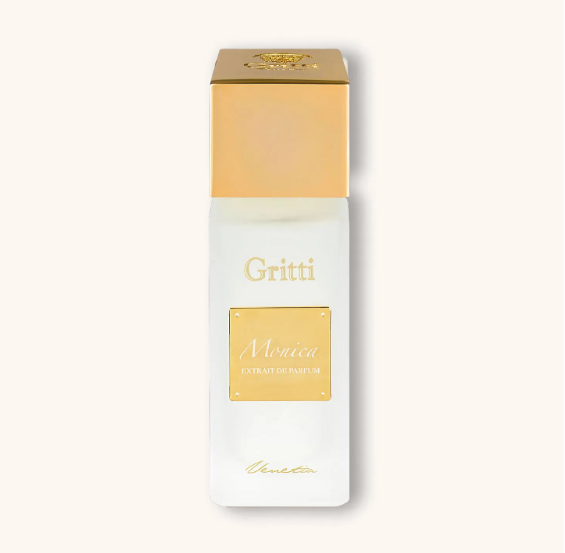 Alt tag: A sleek, elegantly designed perfume bottle of 'Gritti Monica' Extrait de Parfum, featuring a gold cap and minimalist labeling on a soft beige background.