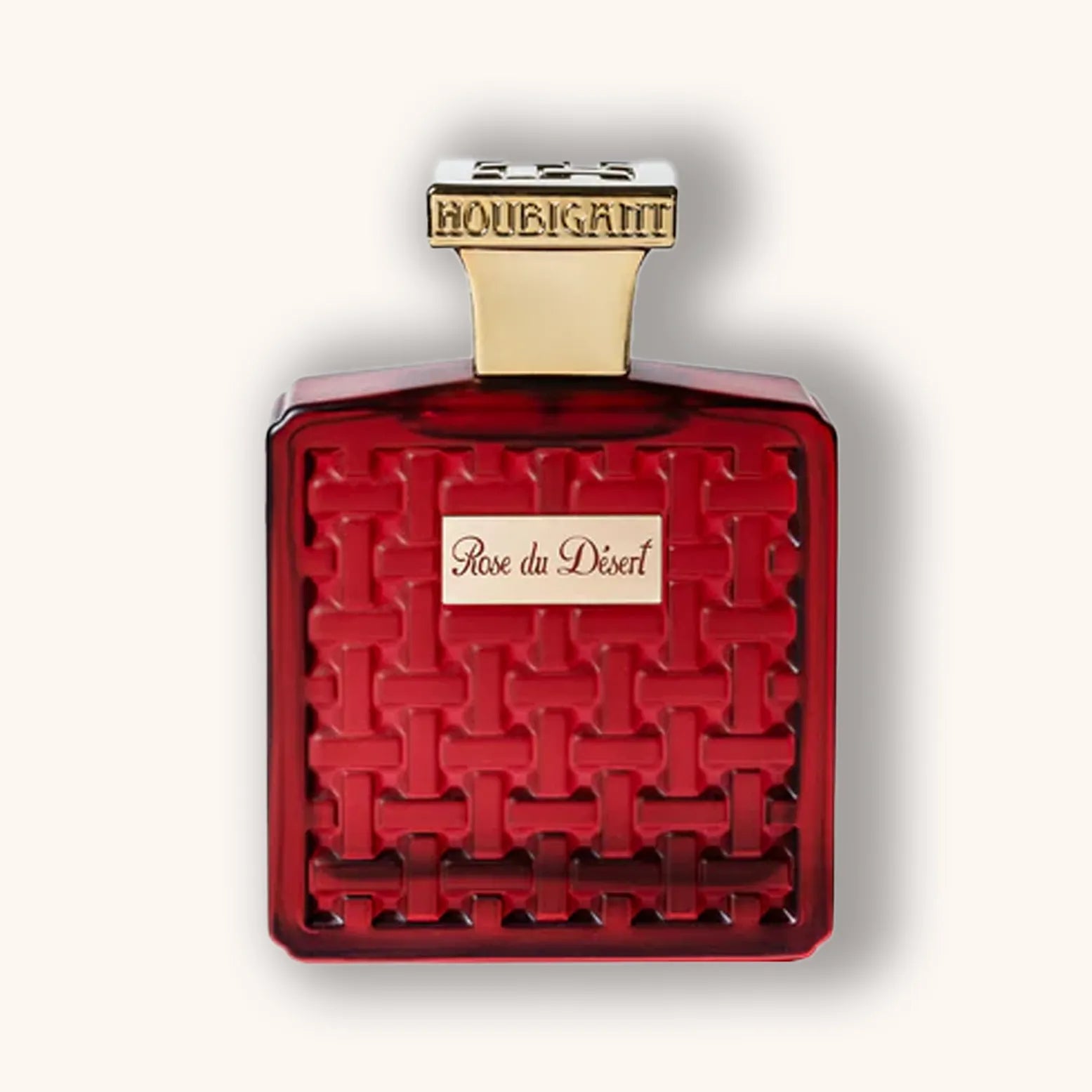 Alt tag: A luxurious red bottle of Houbigant Rose du Désert perfume featuring an intricate woven design and a golden cap, elegantly showcasing its opulent fragrance.