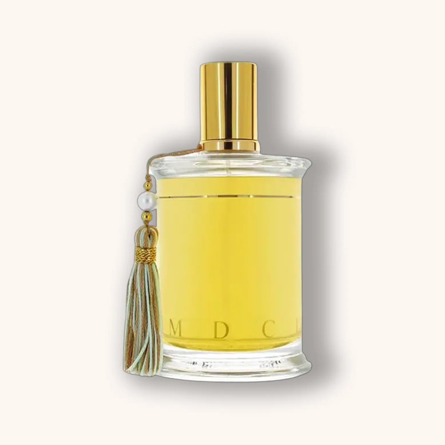 Bottle of MDCI La Belle Hélène perfume with a bright yellow liquid and pastel green tassel.