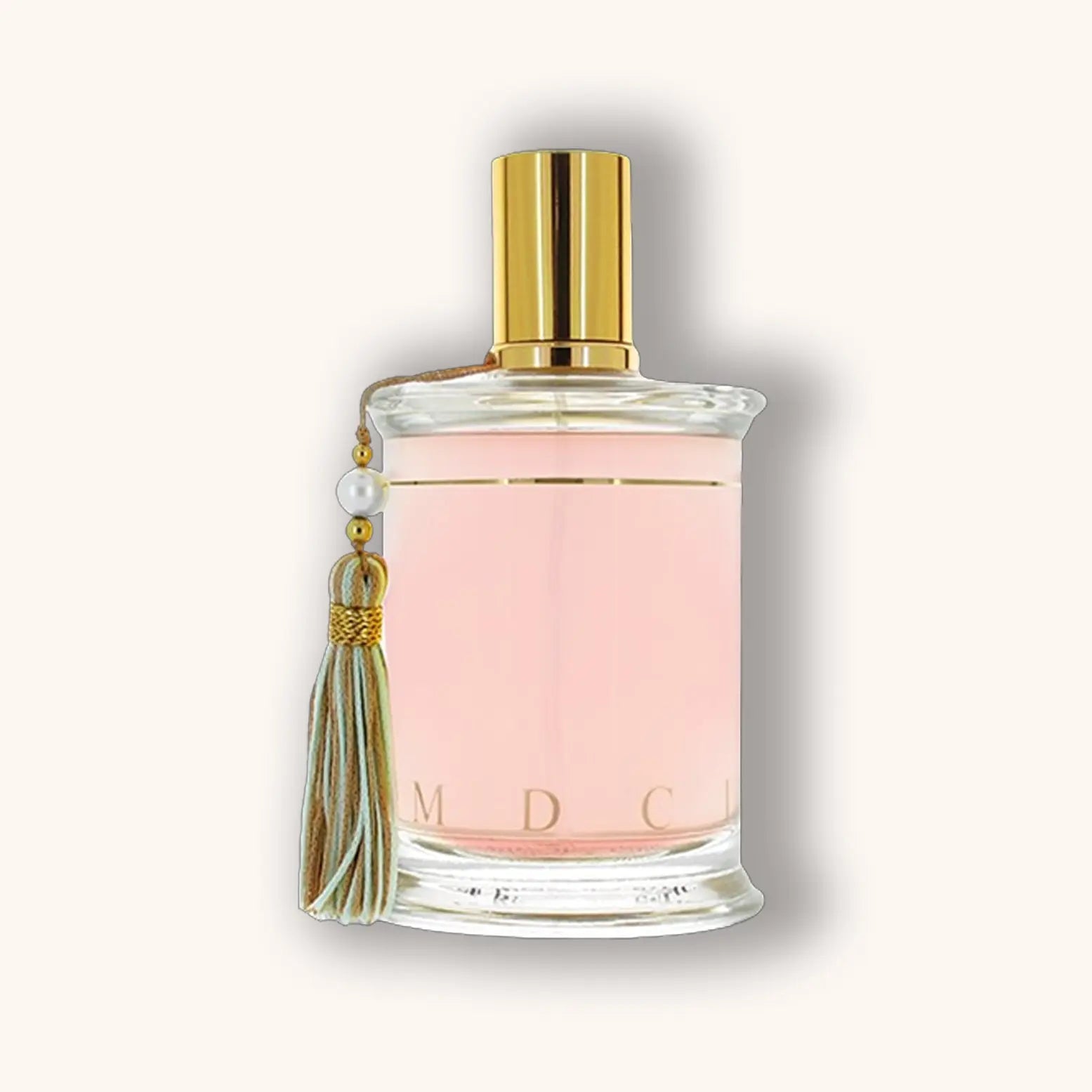 Bottle of MDCI Rose de Siwa perfume filled with a soft pink liquid and pastel green tassel.