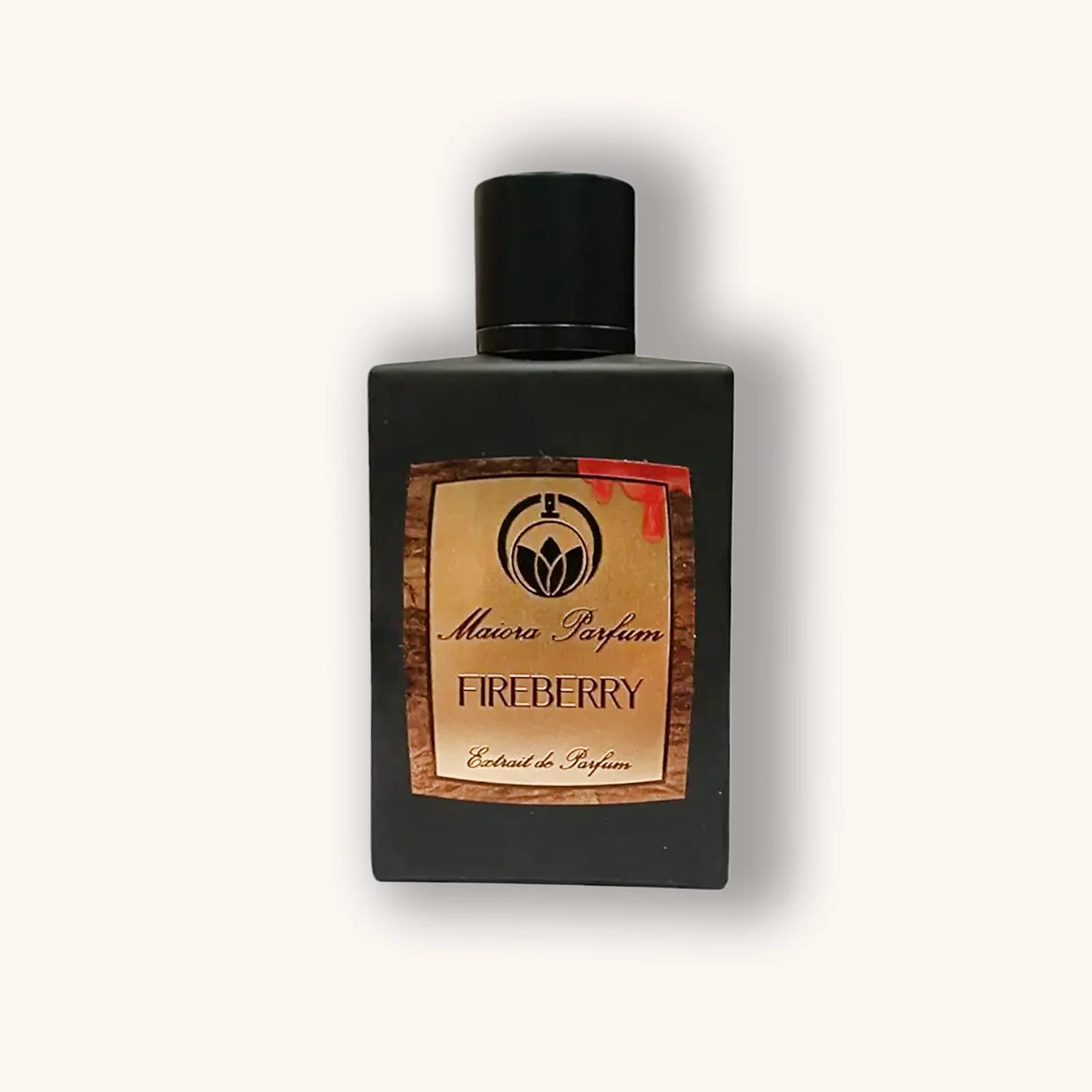 Fireberry by Maiora Parfum in a dark matte bottle with a wood-textured label and red berry accent detailing.