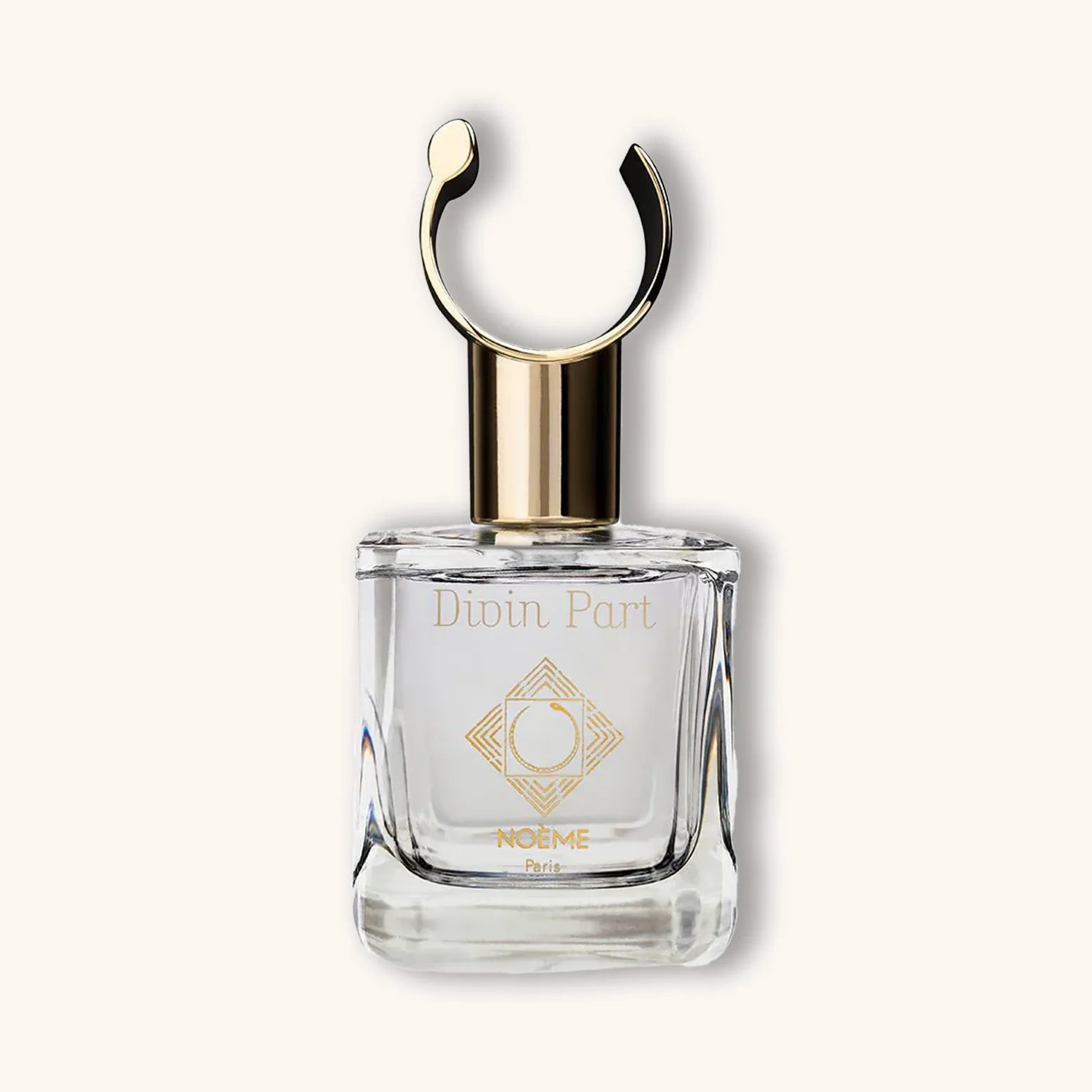 Alt text: A stylish glass bottle of Noème Paris Divin Part perfume, featuring a sleek design with a gold cap and a decorative emblem on the front. The bottle showcases elegance and luxury.