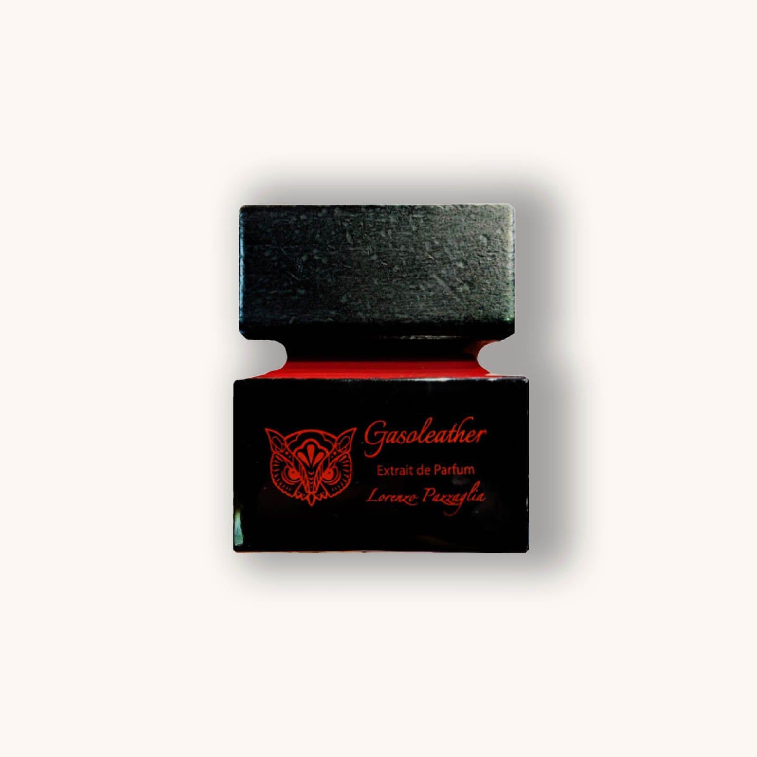 Lorenzo Pazzaglia Gasoleather Extrait de Parfum features an elegant black and red bottle design, embodying a rich, luxurious fragrance. The intricate patterns and sleek shape highlight its sophisticated appeal.
