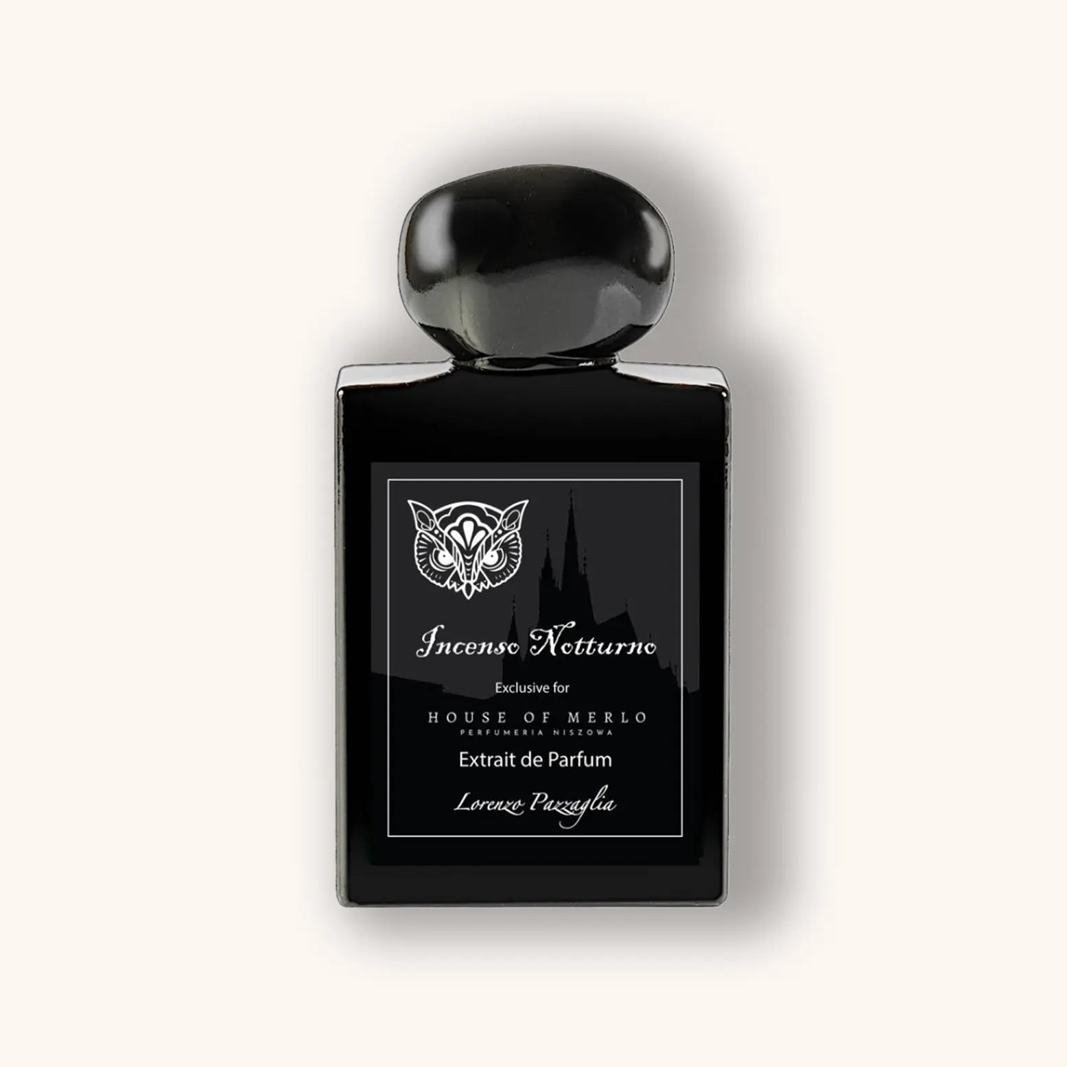 A sleek black bottle of Lorenzo Pazzaglia Incenso Notturno Extrait de Parfum, featuring a decorative label with a butterfly logo and elegant typography. The bottle is designed for the House of Merlo, reflecting a sophisticated and luxurious scent.