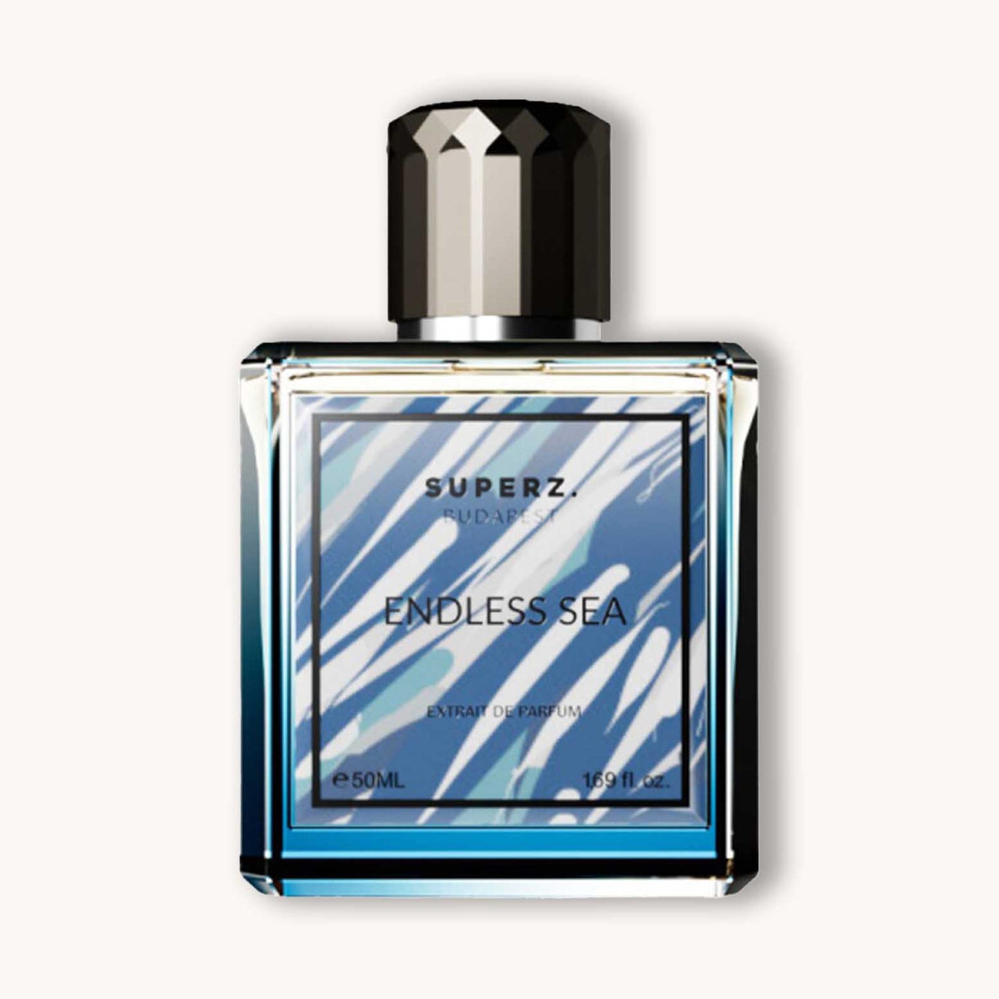 Alt text: "Bottle of Superz Endless Sea perfume, featuring a vibrant blue label with wave designs, housed in an elegantly shaped glass container. The bottle contains 50ml of extrait de parfum."