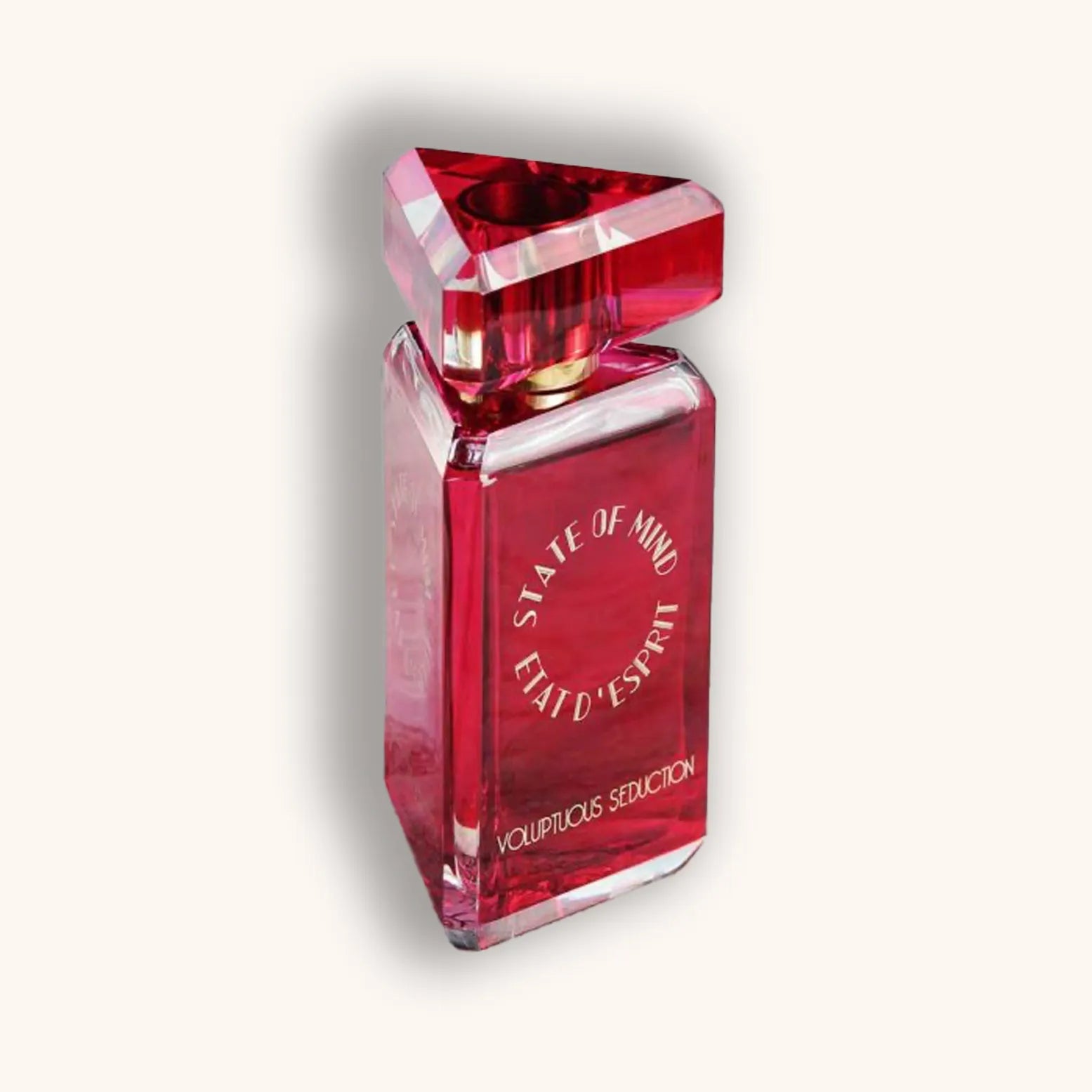 Alt text: A striking red perfume bottle labeled "State of Mind Voluptuous Seduction," featuring a unique triangular cap and elegant design, exuding a sense of allure and sophistication.