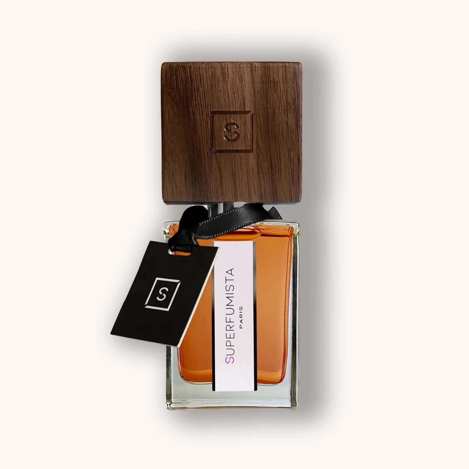 Superfumista Paris luxury perfume bottle with elegant dark wooden cap and black ribbon. Premium French fragrance with violet, leather and oud.