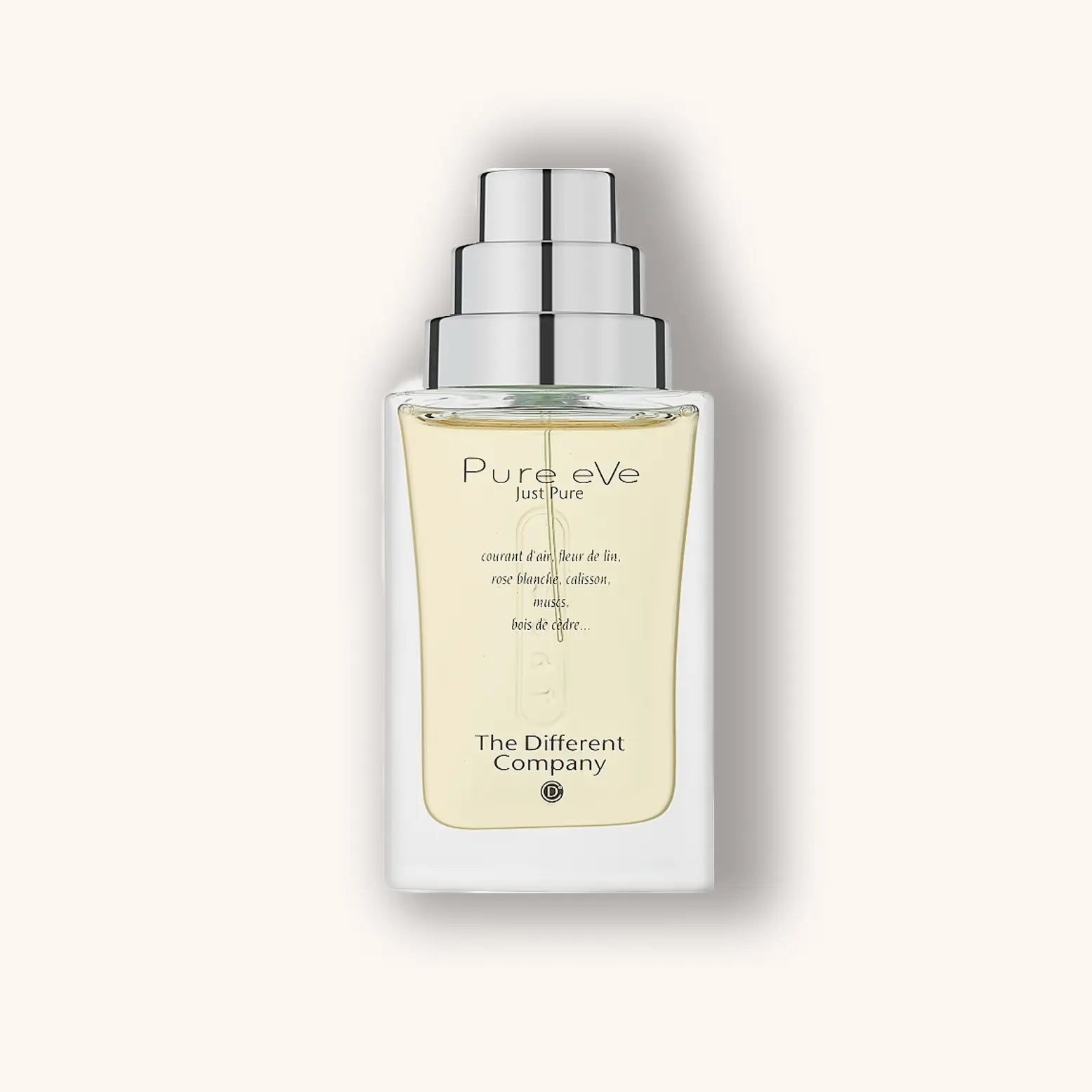 Alt text: A sleek glass bottle of "The Different Company Pure eVe, Just Pure," showcasing a light yellow fragrance with a minimalist design and a silver pump top. The label emphasizes its essence of freshness and purity.