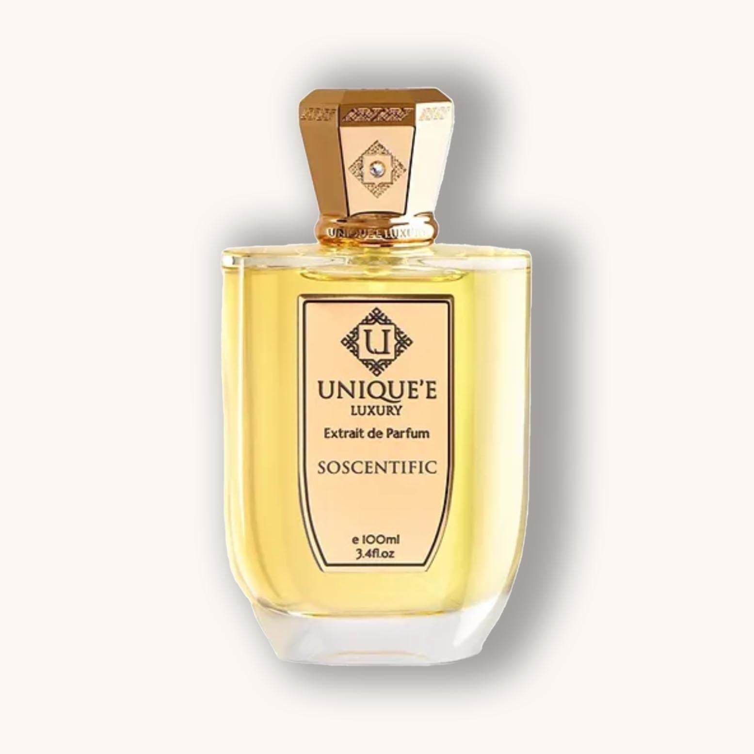 Alt text: A bottle of Unique'e Luxury SoScentific perfume, featuring an elegant design with a golden cap and a clear glass base, containing 100ml of fragrant extract.