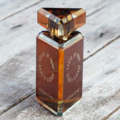 Promo shot of a bottle of perfume of State of Mind Modern Nomad