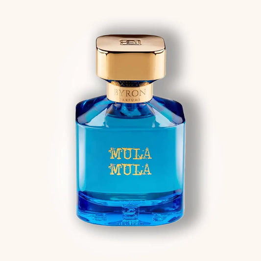 Byron Mula Mula perfume bottle – vibrant blue fragrance bottle with gold cap and lettering, niche luxury perfume.