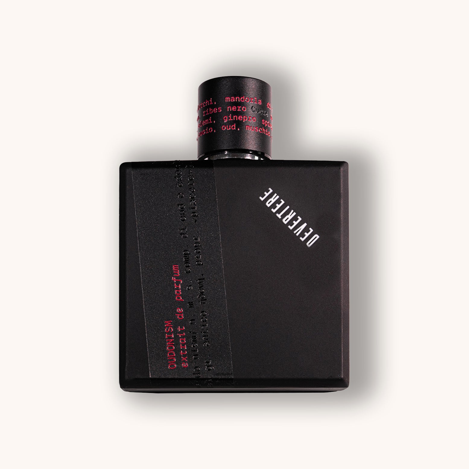 Black perfume bottle of Devertere  Oudonism with red text on a white background