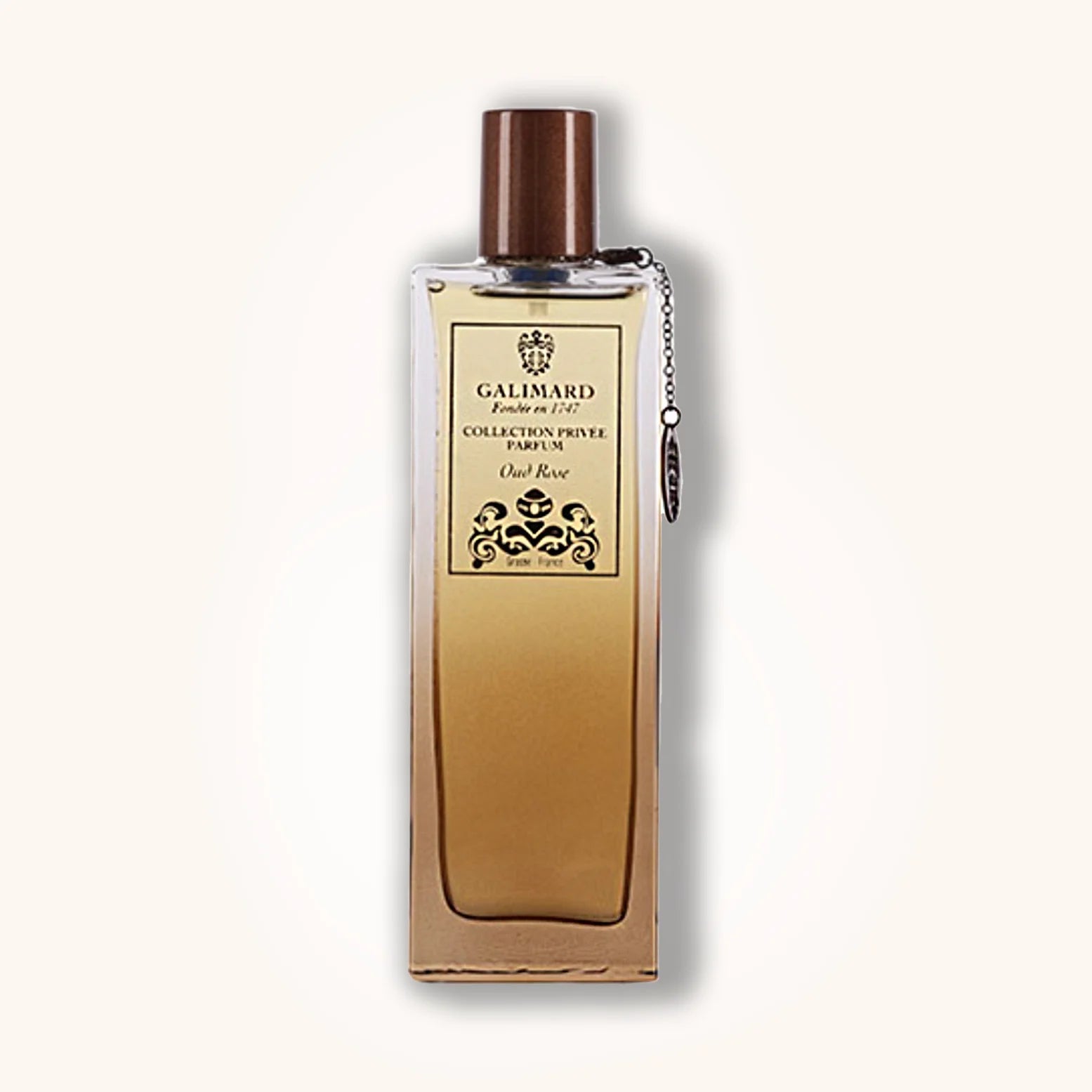 Oud Rose by Galimard in a golden ombré bottle with brown cap and elegant cream label from the Collection Privée line.