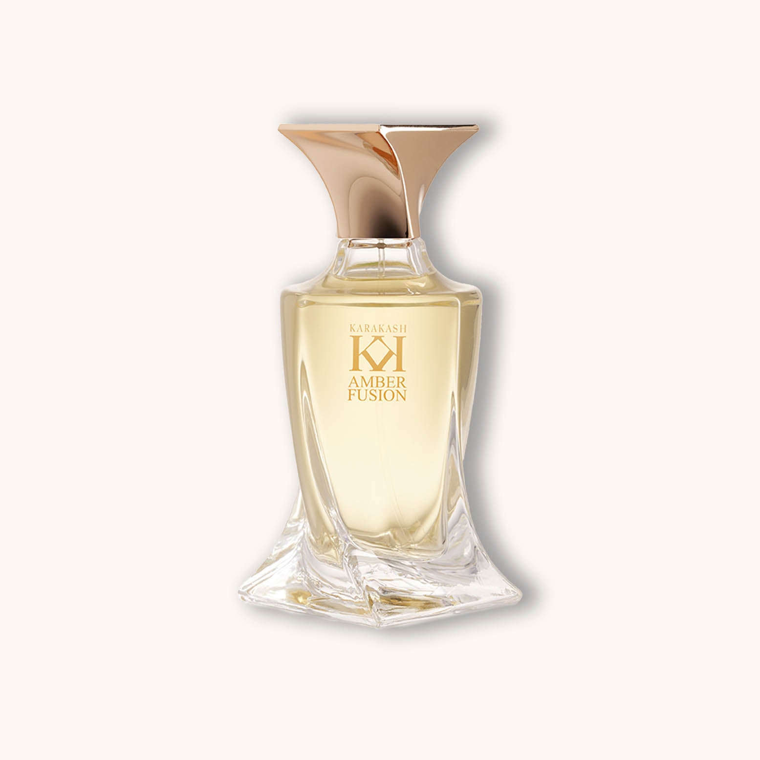 Alt text: A sleek and elegant bottle of Karakash Amber Fusion perfume, featuring a gold-accented cap and a decorative glass base, showcasing a warm amber liquid inside.