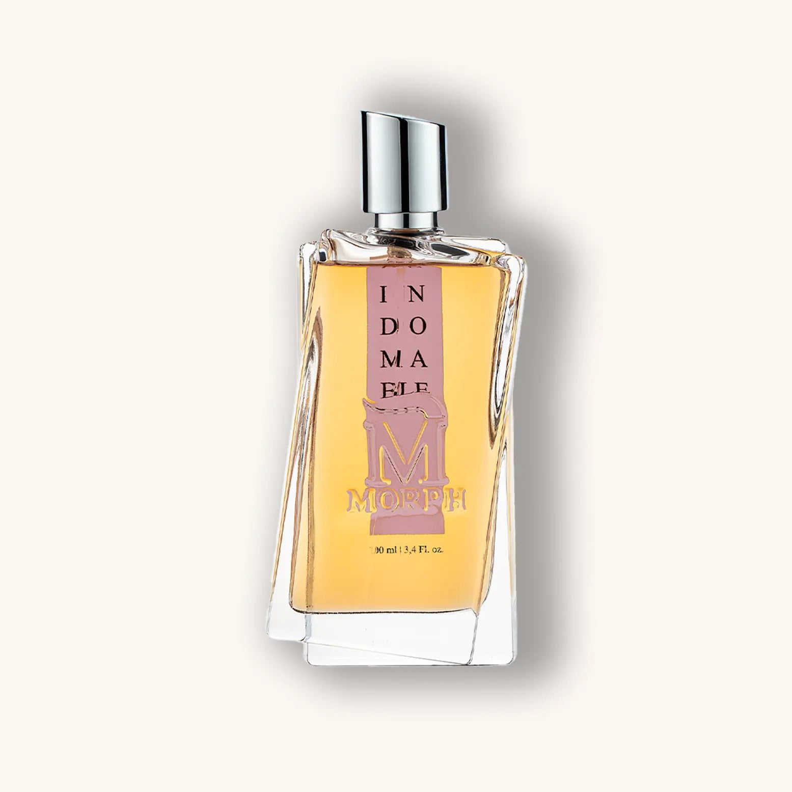 Alt text: A sleek, modern bottle of Morph Indomable perfume, featuring a distinctive shape and elegant label, filled with amber-colored fragrance. The bottle is 90 ml (3.4 fl oz).