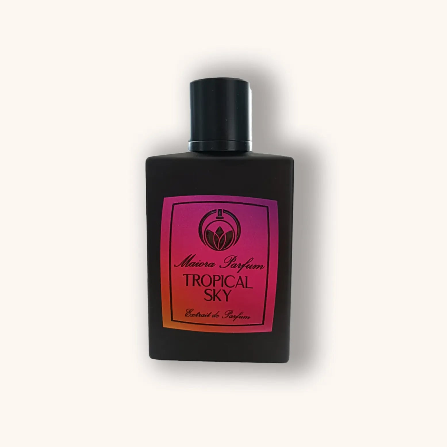 Alt text: "Maiora Parfum Tropical Sky, a sleek black bottle with a vibrant pink and orange label, featuring the product name prominently. The luxurious design reflects the tropical essence of the fragrance."