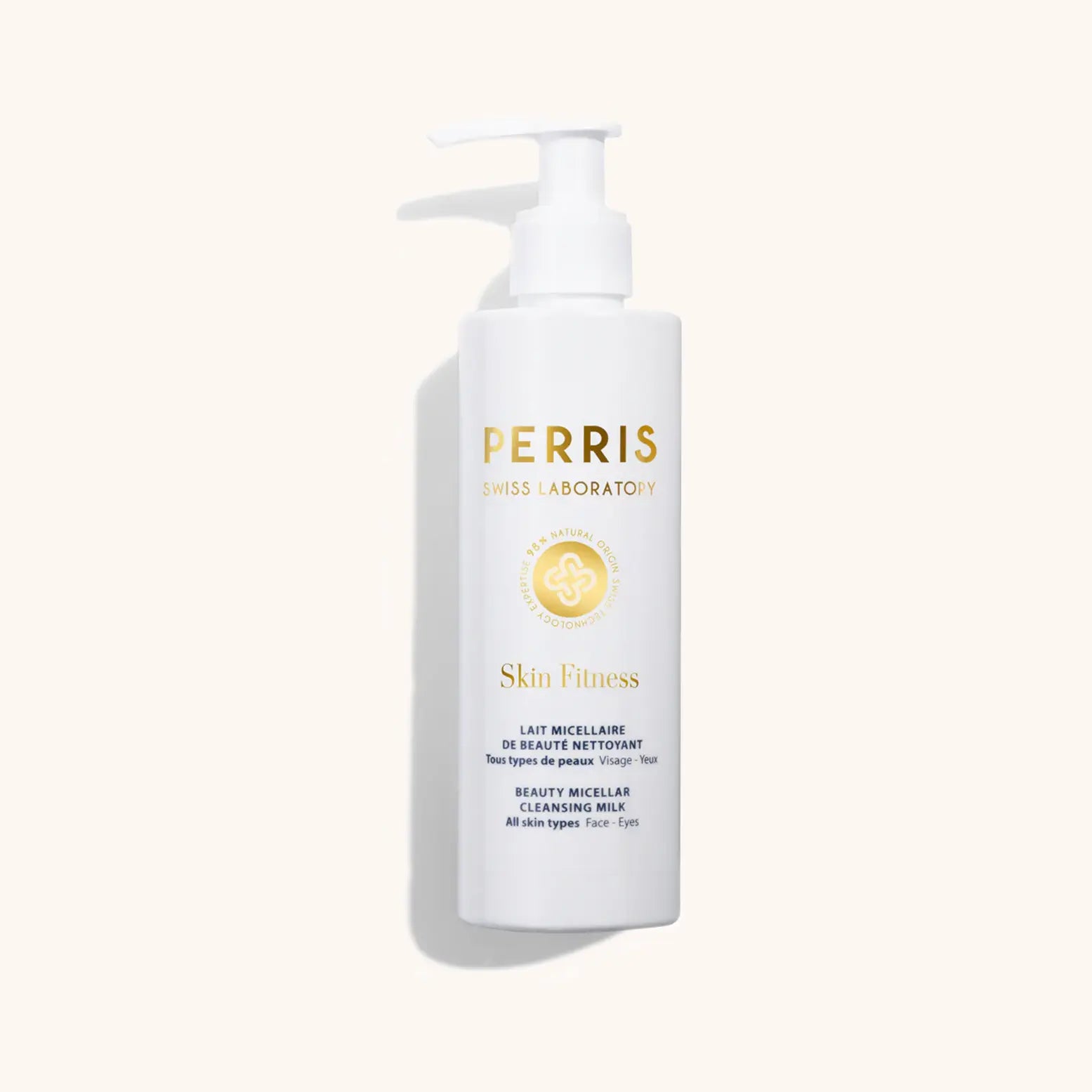 Alt text: A bottle of Perris Swiss Laboratory Beauty Micellar Cleansing Milk, featuring a pump dispenser and a clean, minimalist design. The label highlights its suitability for all skin types, emphasizing its refreshing and gentle cleansing properties.