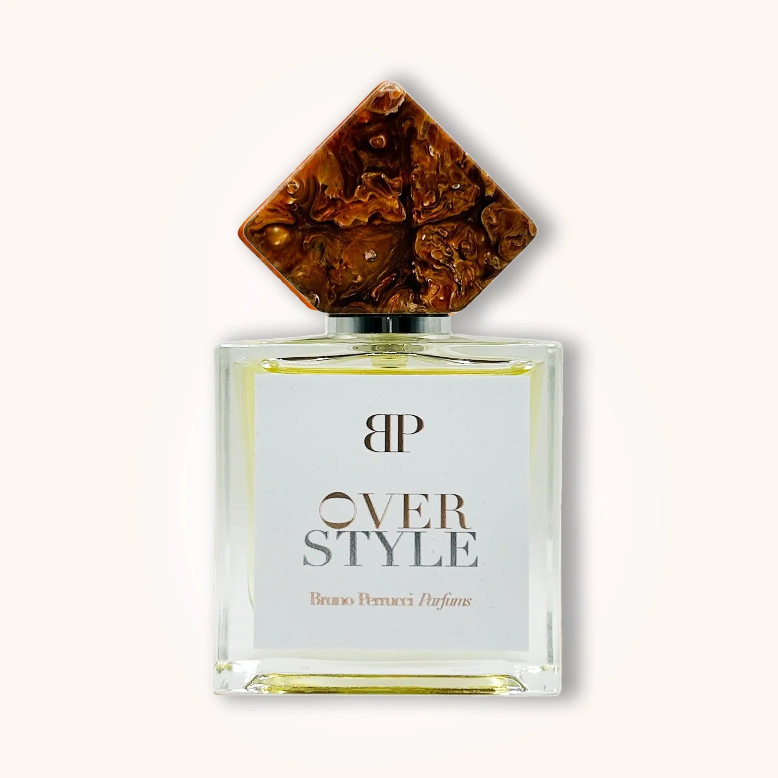 Bruno Perrucci Over Style perfume in a rectangular glass bottle with white label and a unique marbled brown diamond-shaped cap.