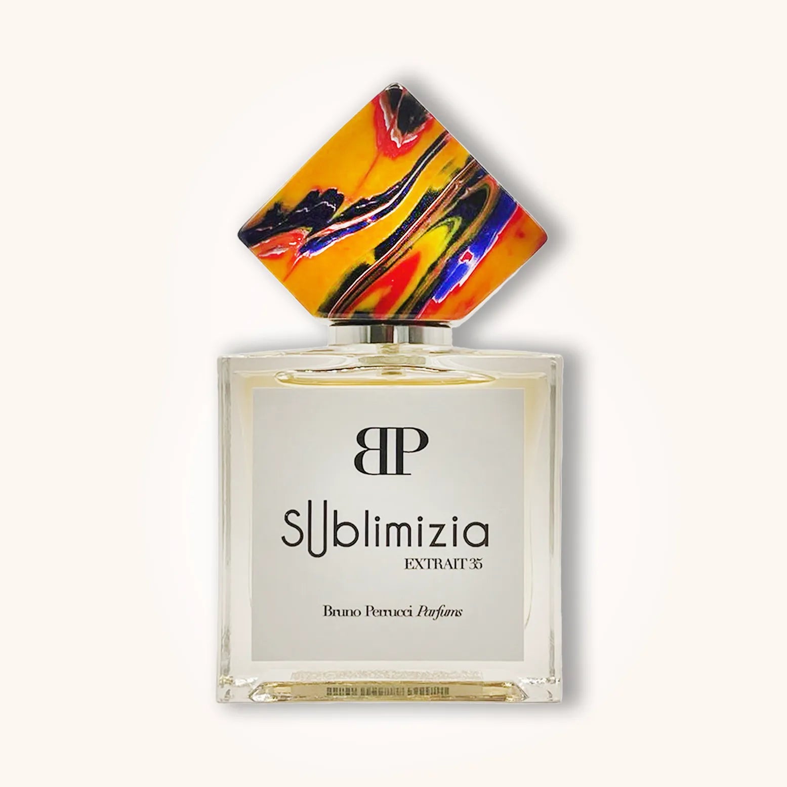 Alt text: A bottle of Bruno Perrucci Sublimizia perfume, featuring an elegant rectangular design and a striking multicolored cap, showcasing luxury and sophistication.