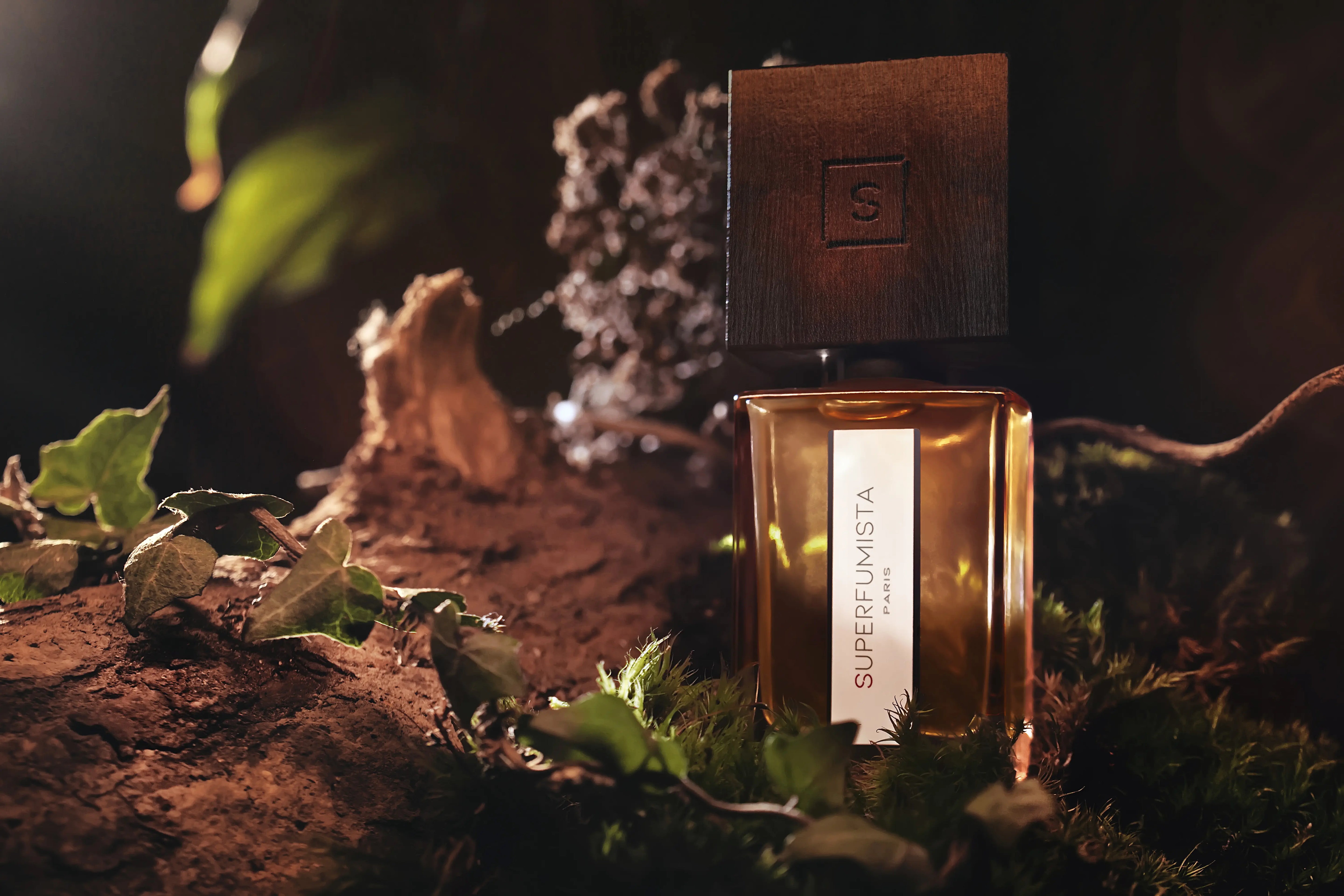 Perfume bottle with a label on a natural background